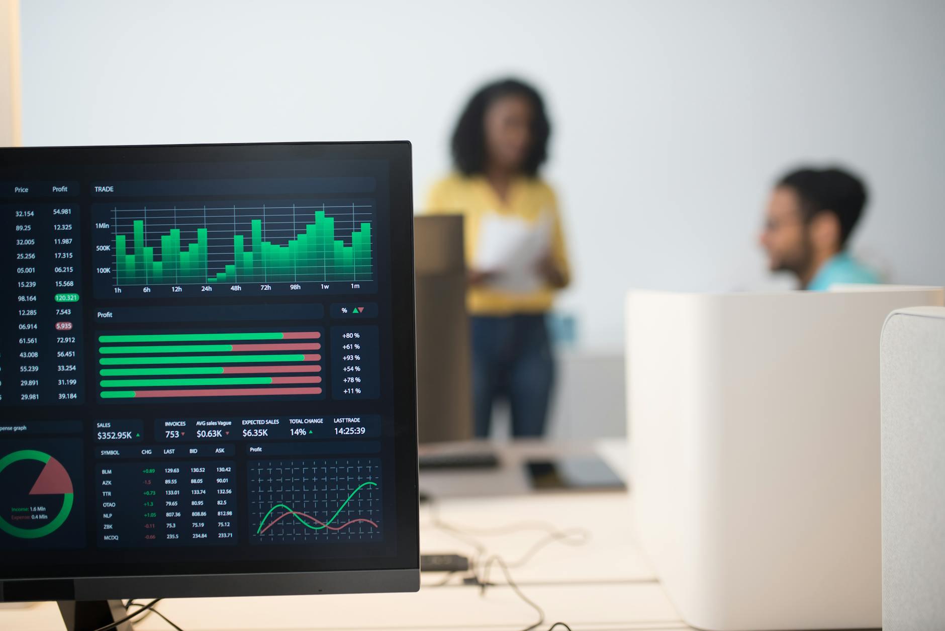 computer monitor with stock exchange figures in an office